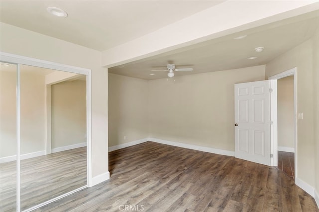 10010 S San Pedro St, Los Angeles, CA 90003 - unfurnished room with wood finished floors, ceiling fan, and baseboards