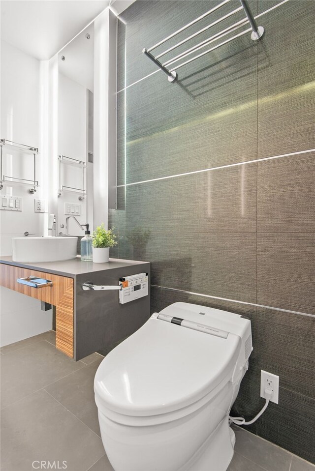 121 S Hope St Unit 9, Los Angeles, CA 90012 - bathroom featuring tile patterned floors, vanity, and toilet