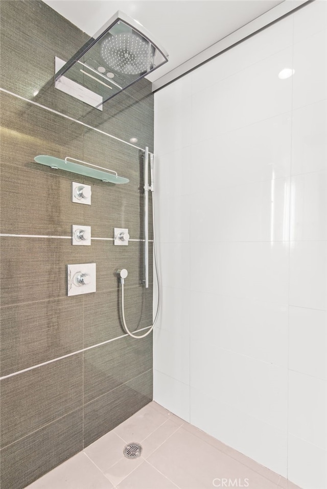 121 S Hope St Unit 9, Los Angeles, CA 90012 - bathroom with a tile shower and tile patterned floors
