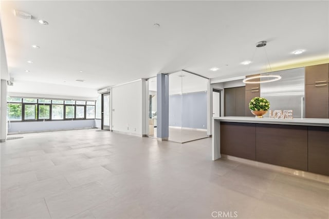 121 S Hope St Unit 9, Los Angeles, CA 90012 - unfurnished room featuring recessed lighting and baseboards