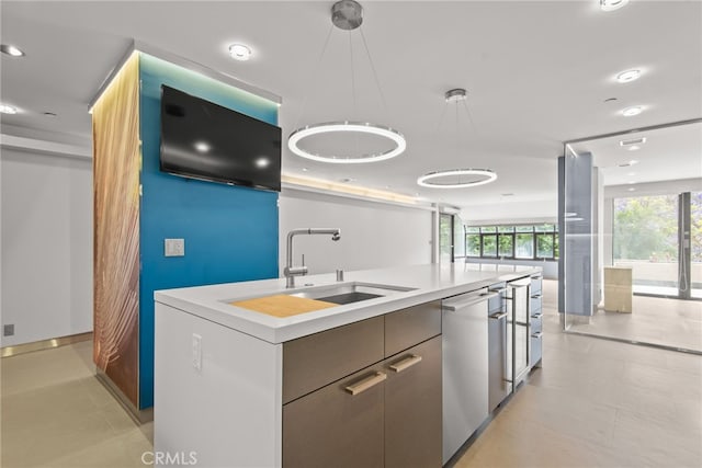 121 S Hope St Unit 9, Los Angeles, CA 90012 - kitchen featuring dishwasher, decorative light fixtures, modern cabinets, light countertops, and an island with sink