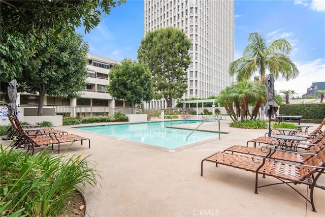 121 S Hope St Unit 9, Los Angeles, CA 90012 - community pool featuring a patio