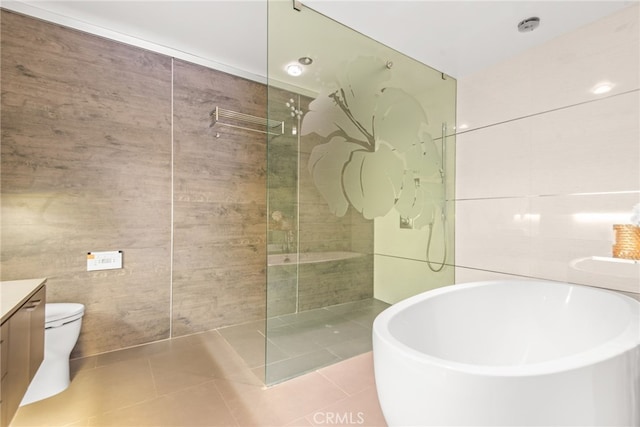 121 S Hope St Unit 9, Los Angeles, CA 90012 - bathroom featuring vanity, a walk in shower, and tile patterned flooring