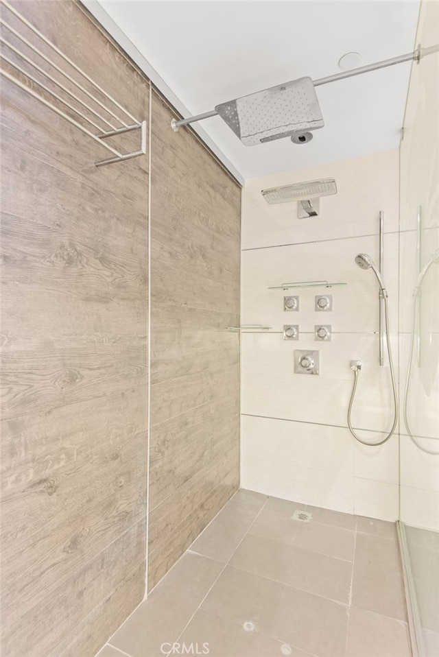 121 S Hope St Unit 9, Los Angeles, CA 90012 - bathroom featuring a tile shower and tile patterned floors