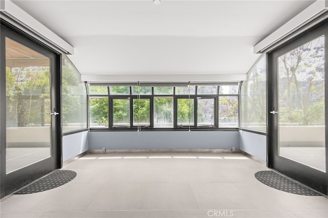 121 S Hope St Unit 9, Los Angeles, CA 90012 - unfurnished sunroom featuring healthy amount of natural light