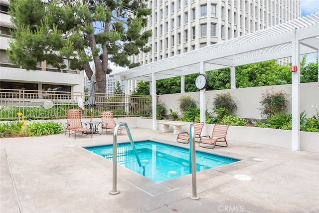 121 S Hope St Unit 9, Los Angeles, CA 90012 - view of pool featuring a pergola, a patio area, and a pool