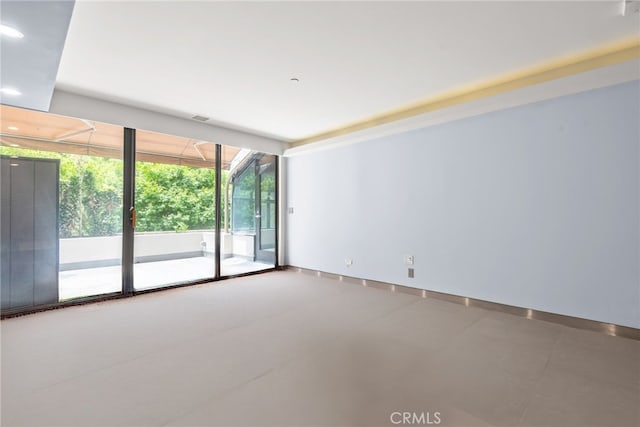 121 S Hope St Unit 9, Los Angeles, CA 90012 - spare room featuring a sunroom and recessed lighting