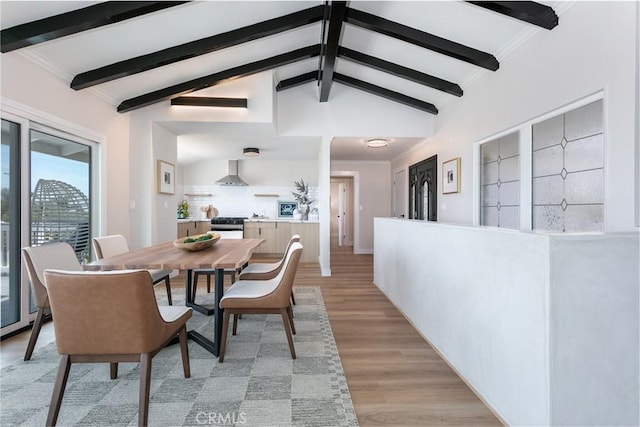 2145 Mcrae Dr, San Pedro, CA 90732 - dining room featuring light wood-style floors and ornamental molding