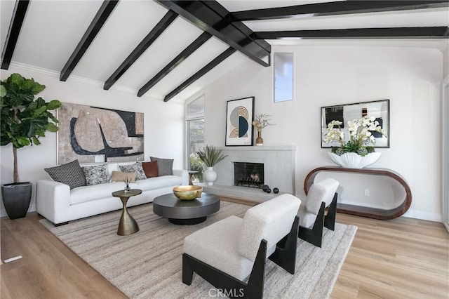 2145 Mcrae Dr, San Pedro, CA 90732 - living area featuring light wood finished floors, a high end fireplace, and baseboards