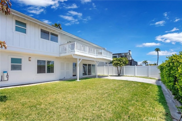 2145 Mcrae Dr, San Pedro, CA 90732 - rear view of house with a balcony, board and batten siding, and a patio