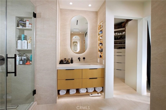 3863 Sherwood Pl, Sherman Oaks, CA 91423 - bathroom featuring vanity, a stall shower, and built in shelves