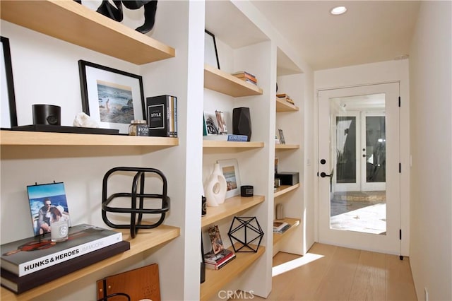 3863 Sherwood Pl, Sherman Oaks, CA 91423 - corridor featuring built in features, wood finished floors, and recessed lighting