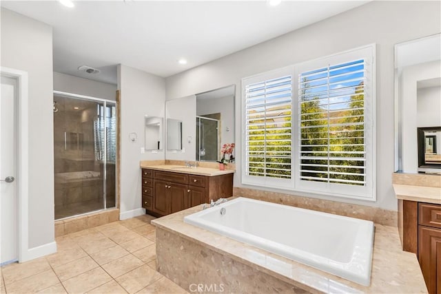 28181 Via Del Mar, San Juan Capistrano, CA 92675 - bathroom with vanity, a shower stall, a bath, tile patterned floors, and recessed lighting
