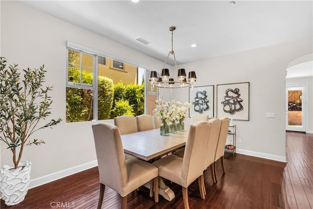 28181 Via Del Mar, San Juan Capistrano, CA 92675 - dining room featuring a chandelier, plenty of natural light, arched walkways, dark wood-type flooring, and recessed lighting