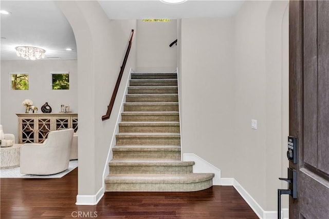 28181 Via Del Mar, San Juan Capistrano, CA 92675 - stairs featuring arched walkways, wood finished floors, baseboards, and recessed lighting