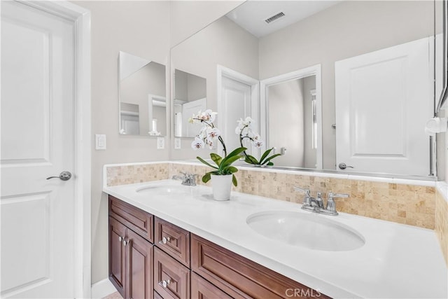 28181 Via Del Mar, San Juan Capistrano, CA 92675 - bathroom with double vanity and decorative backsplash