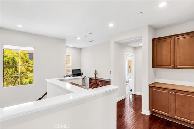 28181 Via Del Mar, San Juan Capistrano, CA 92675 - kitchen featuring dark wood-type flooring, recessed lighting, baseboards, light countertops, and brown cabinets
