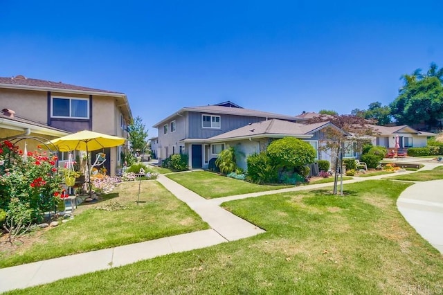 12158 Orange Crest Ct Unit 4, Lakeside, CA 92040 - view of front of property with a front lawn, stucco siding, and a residential view