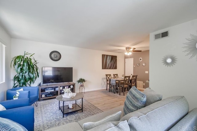 12158 Orange Crest Ct Unit 4, Lakeside, CA 92040 - living room with wood finished floors, ceiling fan, and baseboards