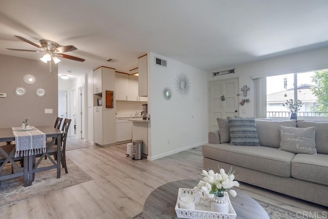 12158 Orange Crest Ct Unit 4, Lakeside, CA 92040 - living area with light wood-style floors, a ceiling fan, and baseboards