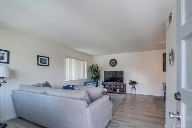 12158 Orange Crest Ct Unit 4, Lakeside, CA 92040 - living area featuring light wood-type flooring and baseboards