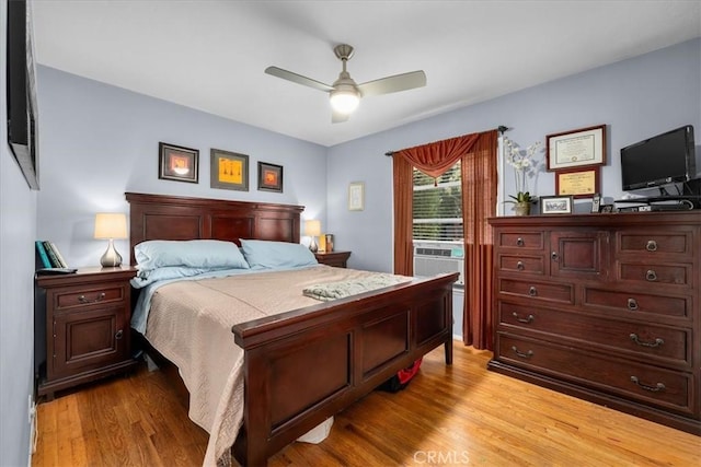 2515 Armour Ln, Redondo Beach, CA 90278 - bedroom with light wood finished floors, cooling unit, and a ceiling fan