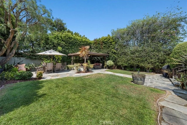 2515 Armour Ln, Redondo Beach, CA 90278 - view of green lawn with a gazebo and a patio area