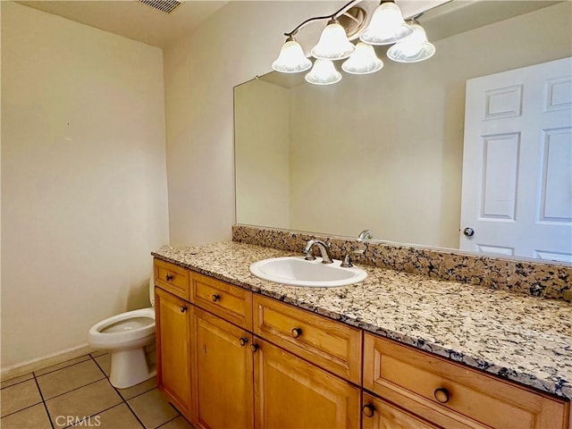 700 Meyer Ln, Redondo Beach, CA 90277 - bathroom with toilet, vanity, a chandelier, tile patterned floors, and baseboards