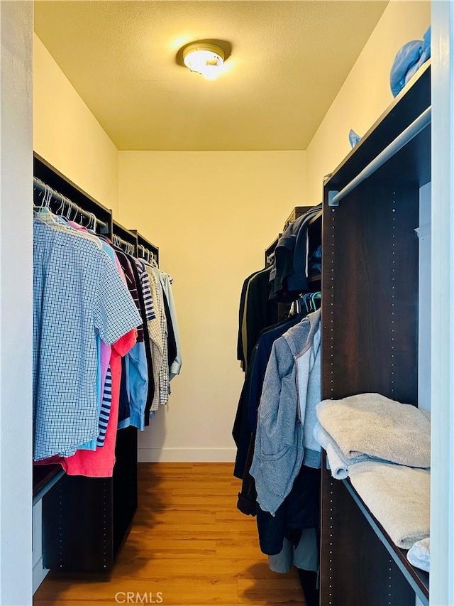 700 Meyer Ln, Redondo Beach, CA 90277 - spacious closet featuring wood finished floors