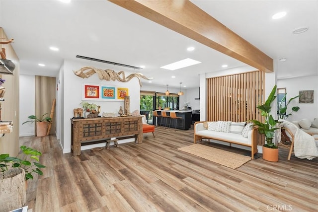 17630 Mapes Ave, Cerritos, CA 90703 - living room featuring a skylight, light wood-style floors, and recessed lighting