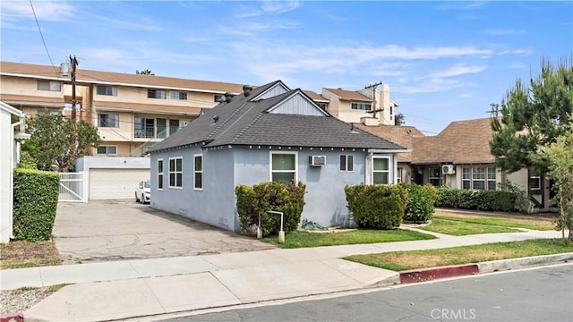 120 Lukens Pl, Glendale, CA 91206 - view of front of property featuring a detached garage, stucco siding, and roof with shingles