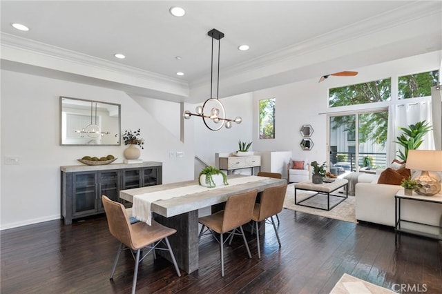 5547 Strand Unit 101, Hawthorne, CA 90250 - dining room featuring a chandelier, dark wood-type flooring, crown molding, recessed lighting, and baseboards