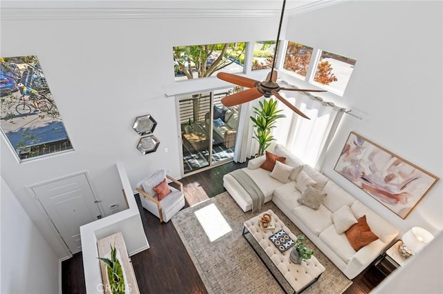 5547 Strand Unit 101, Hawthorne, CA 90250 - living area with wood finished floors, crown molding, healthy amount of natural light, a towering ceiling, and a ceiling fan