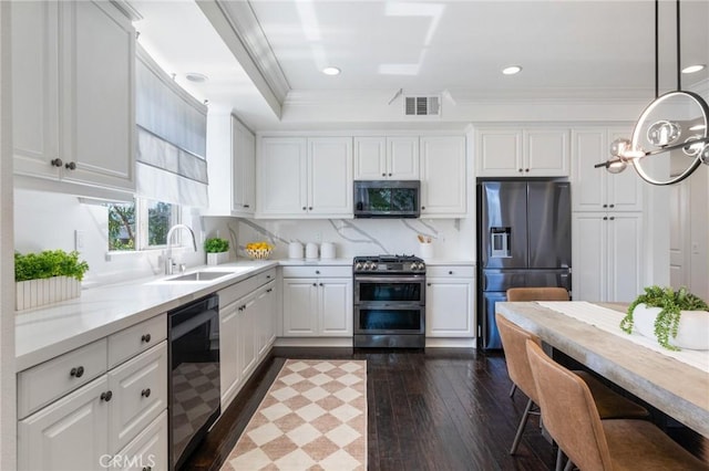 5547 Strand Unit 101, Hawthorne, CA 90250 - kitchen with appliances with stainless steel finishes, a sink, light countertops, white cabinets, and recessed lighting