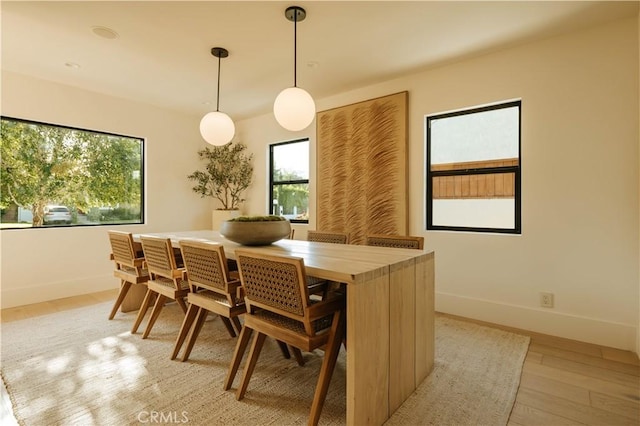 4522 Calhoun Ave, Sherman Oaks, CA 91423 - dining area with light wood-style floors and baseboards