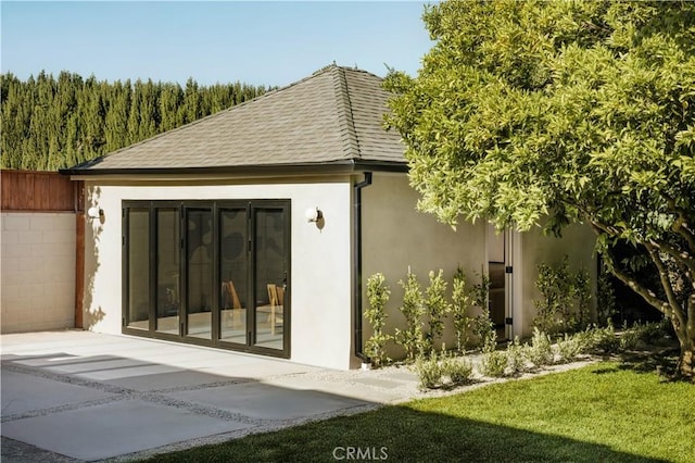 4522 Calhoun Ave, Sherman Oaks, CA 91423 - rear view of house with a patio area, roof with shingles, and stucco siding