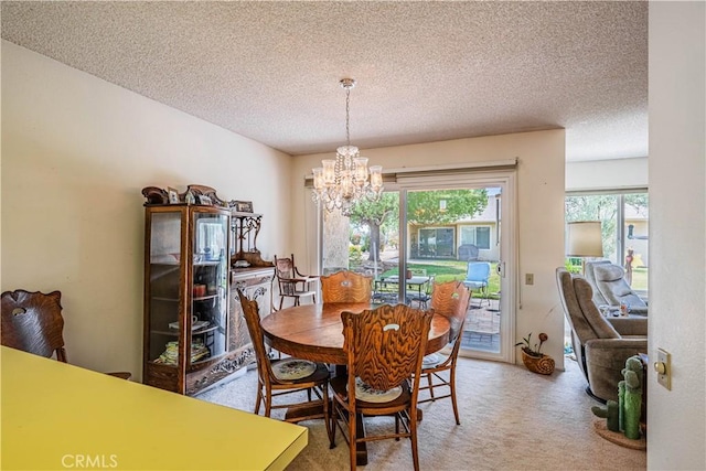 28030 Northwood Dr, Menifee, CA 92586 - dining area featuring a chandelier, a textured ceiling, and light carpet
