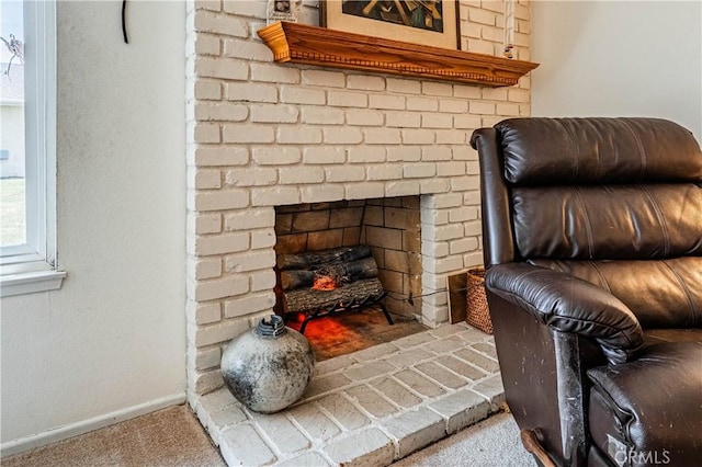 28030 Northwood Dr, Menifee, CA 92586 - detailed view of carpet, a brick fireplace, and baseboards