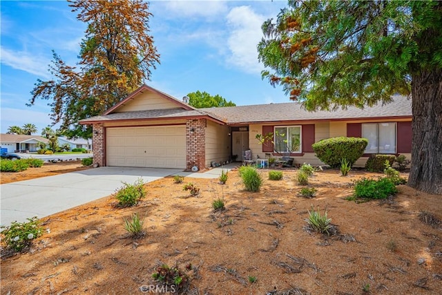 28030 Northwood Dr, Menifee, CA 92586 - single story home with a garage, concrete driveway, and brick siding