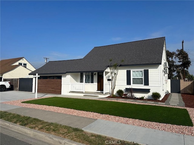 6082 Bannock Rd, Westminster, CA 92683 - view of front of home featuring roof with shingles, driveway, and an attached garage