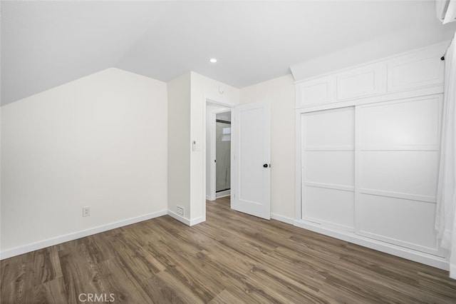 6082 Bannock Rd, Westminster, CA 92683 - unfurnished bedroom with dark wood-style floors, baseboards, recessed lighting, a closet, and lofted ceiling
