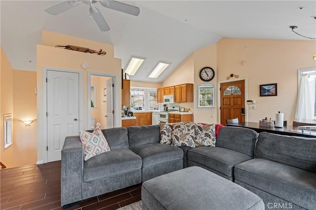 1285 Yukon Dr, Lake Arrowhead, CA 92352 - living room featuring dark wood finished floors, vaulted ceiling, and ceiling fan