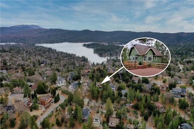1285 Yukon Dr, Lake Arrowhead, CA 92352 - drone / aerial view of a water and mountain view and a heavily wooded area