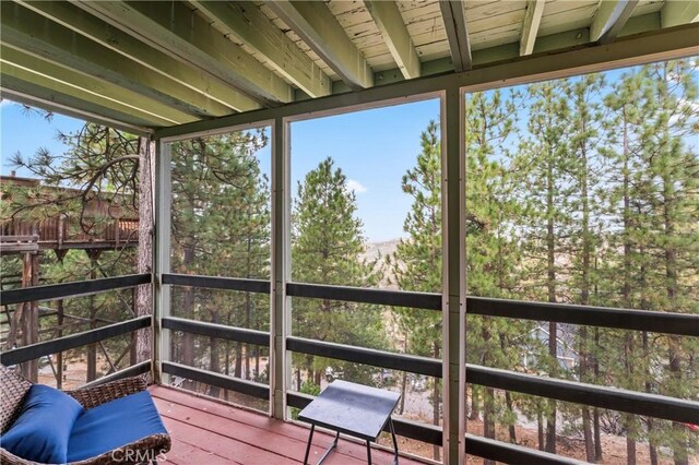 1285 Yukon Dr, Lake Arrowhead, CA 92352 - sunroom / solarium featuring beam ceiling and plenty of natural light