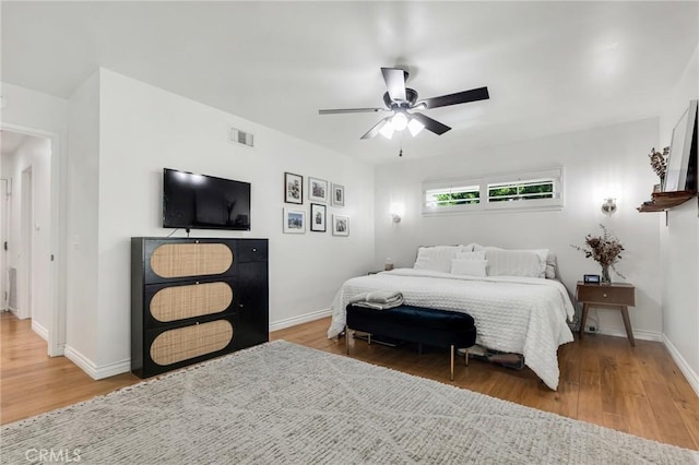 7612 Vicky Ave, West Hills, CA 91304 - bedroom with wood finished floors, baseboards, and a ceiling fan