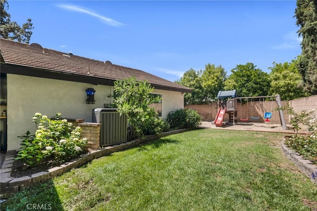 7612 Vicky Ave, West Hills, CA 91304 - view of yard featuring a playground and central AC unit