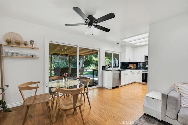 7612 Vicky Ave, West Hills, CA 91304 - dining area with light wood-type flooring and a ceiling fan
