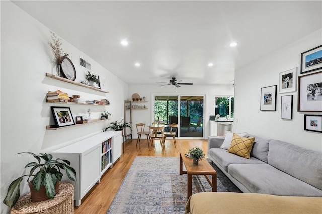 7612 Vicky Ave, West Hills, CA 91304 - living area with a ceiling fan, recessed lighting, and light wood-style flooring