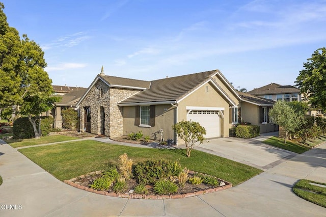 3806 Golden Pond Dr, Camarillo, CA 93012 - view of front of home with an attached garage, stucco siding, stone siding, driveway, and a front lawn