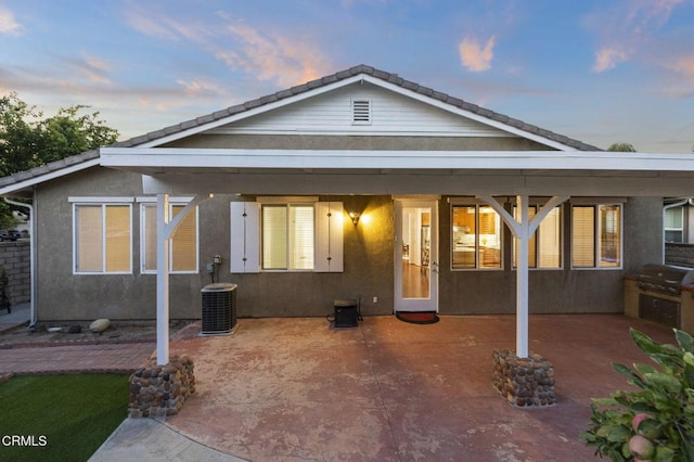 3806 Golden Pond Dr, Camarillo, CA 93012 - back of property with stucco siding and a patio